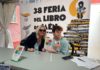 Javier García, joven escritor con parálisis cerebral, presenta su primera novela en una abarrotada sala de presentaciones de la Feria del Libro de Jaén