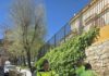 Reparación y reposición de un muro dañado en el barrio de Santa Isabel